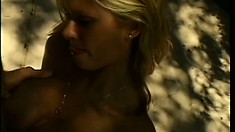 Busty blonde receives a big cock in her ass and a huge load in her mouth by the pool
